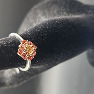 F-7 Silvertone ring with multicored stones